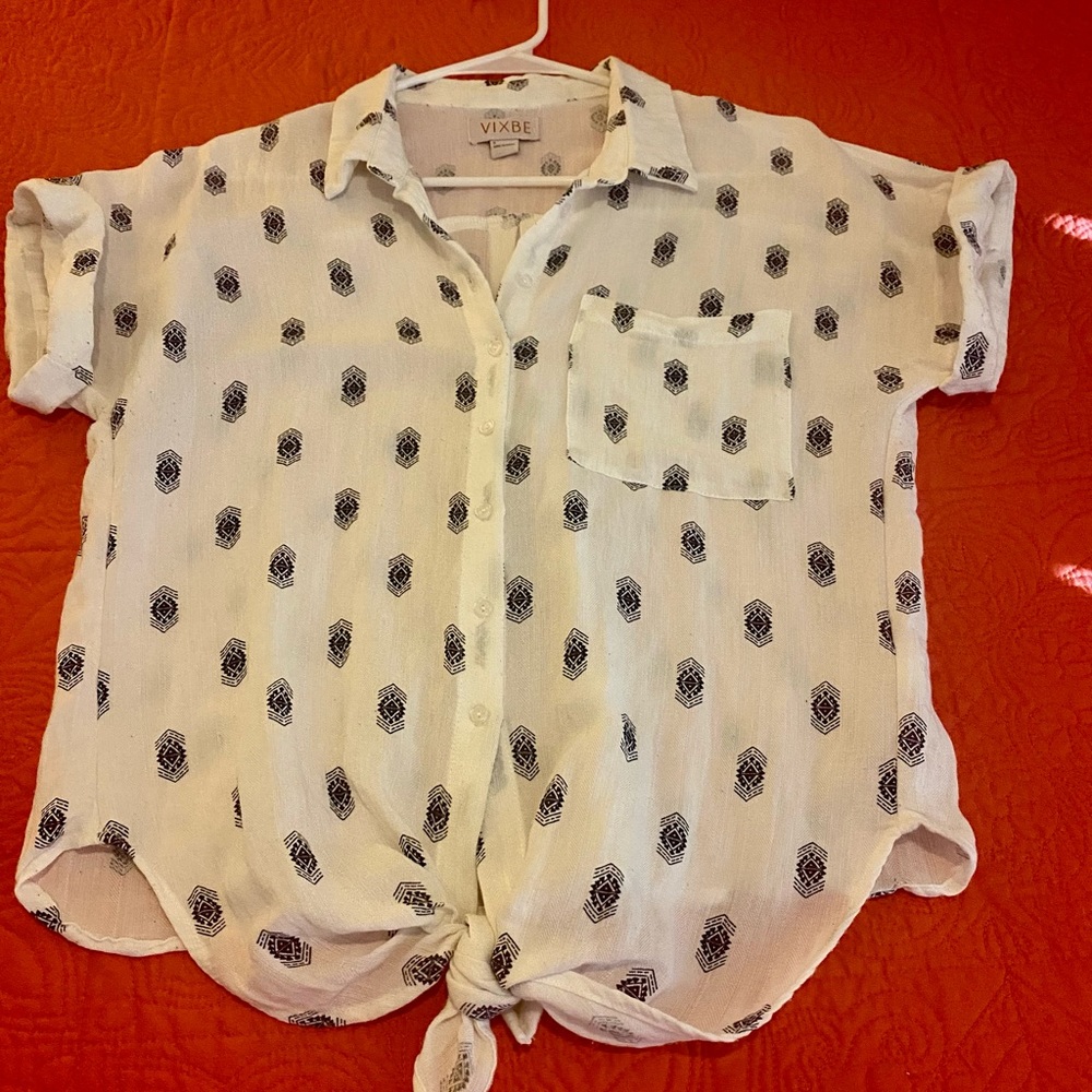 Light weight short sleeve blouse.